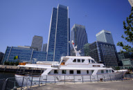 Yachts moored at Canary Wharf, London, Britain - 23 Jul 2012