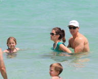 Mark Wahlberg family vacations days in Miami Beach.The 40-year-old actor showed off his muscles in the beach.
