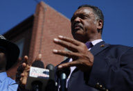 Jesse Jackson visits Holmes apartment