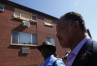 Jesse Jackson visits Holmes apartment