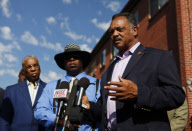 Jesse Jackson visits Holmes apartment