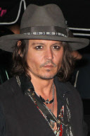 Johnny Depp Leaves a Party at Pink Taco