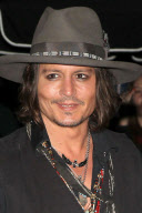 Johnny Depp Leaves a Party at Pink Taco