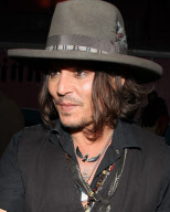 Johnny Depp Leaves a Party at Pink Taco