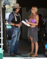 Jordan Carver is getting cozy with a Johnny Depp look-alike