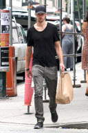 *EXCLUSIVE* Alexander Skarsgard tries to hide his bruised face in Vancouver [NO Canada, Germany, Austria]