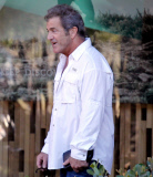 Mel Gibson clashes with photographers while out with daughter