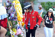 A Michael Jackson Look-A-Like visits the King of Pop on his 54th Birthday 