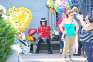 A Michael Jackson Look-A-Like visits the King of Pop on his 54th Birthday 