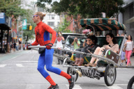Spider-Man Flies and Offers Rides In His Rickshaw