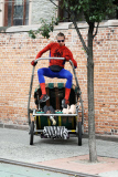 Spider-Man Flies and Offers Rides In His Rickshaw