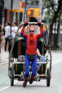 Spider-Man Flies and Offers Rides In His Rickshaw
