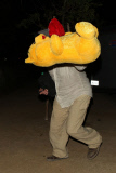 Nick Nolte carrying a large teddy bear at the Malibu Chili Cook Off