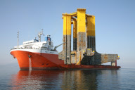 Australian Navy transport new battleship using one of the superships of Dockwise - Aug 2012