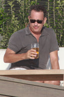 Tom Hanks enjoys a cold one!