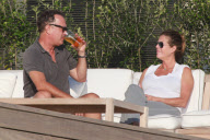 Tom Hanks enjoys a cold one!