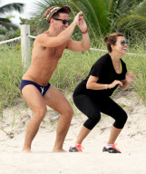 Kourtney Kardashian working up a sweat on the beach