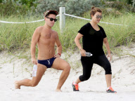 Kourtney Kardashian working up a sweat on the beach