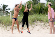 Kourtney Kardashian working up a sweat on the beach