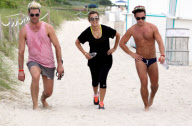 Kourtney Kardashian working up a sweat on the beach