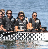 The Kardashian family was seen at a park doing stretches and practicing their rowing skills before heading out on boats in Miami, Florida 
