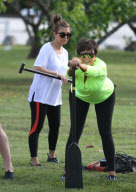 The Kardashian family was seen at a park doing stretches and practicing their rowing skills before heading out on boats in Miami, Florida 

