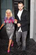 Christina Aguilera shows some color on a dinner date with Matthew Rutler