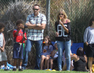HEIDI KLUM seen with her hunky boyfriend/  bodyguard MARTIN KIRSTEN at her sons football game