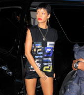 Rihanna greets fans outside of her hotel