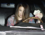 Amber Heard and a blonde girlfriend leaving Matsuhisa