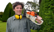 Patrick Cooke, who spends two weeks trimming 12, 30ft high yew tree pyramids at Athelhampton House, Dorset, Britain - 04 Oct 2012