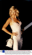 Supermodel Linda Evangelista Pictured On The Catwalk Wearing Versace In Milan Linda Evangelista (born May 10 1965) Is A Canadian Model. She Has Been Featured On Over 600 Magazine Covers. Evangelista Is Mostly Known For Being The Longtime Muse Of Phot