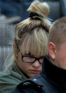 Demi Lovato Arrives at LAX And Hides Behind A Pillow