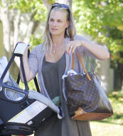 Molly Sims with her sleeping baby