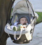 Molly Sims with her sleeping baby