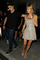 Paris Hilton shows off her long legs as she leaves Spago with River Viiperi [NO Australia, New Zealand]