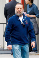 Russell Crowe stretches his legs during a break from filming "Noah"