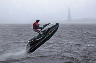 Jet skiier braves Sandy's waves
