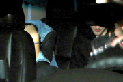 Robert Pattinson and Kristen Stewart are camera shy as they leave the Sayers Club