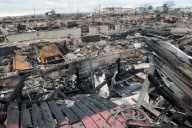 Breezy Point residents tour destroyed homes