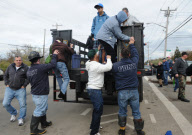 Breezy Point residents tour destroyed homes