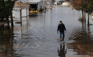 Breezy Point residents tour destroyed homes