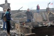 Breezy Point residents tour destroyed homes