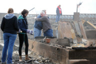 Breezy Point residents tour destroyed homes