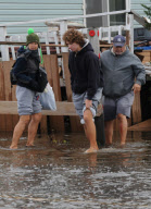 Breezy Point residents tour destroyed homes
