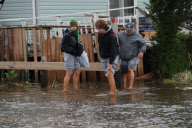 Breezy Point residents tour destroyed homes
