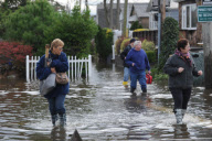 Breezy Point residents tour destroyed homes