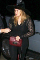 Hilary Duff heads to a Halloween party