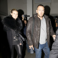 Heidi Klum And Bodyguard Boyfriend Arrive Into LAX