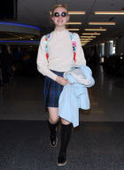 Elle Fanning Full of Smiles at LAX 